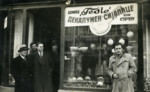 Aleksander Todorov (right) in front of his electrical store.