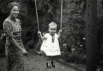 Portrait of a German Jewish mother and daughter. 

Pictured is Esbeth Spiro with her daughter, Shoshana, seated on a swing.