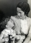 Portrait of a German Jewish mother and son. 

Pictured is Esbeth Spiro (center) and her son Shimon.