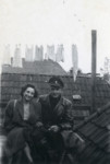 A Dutch Jewish woman poses on a rooftop with one of her wartime rescuers.