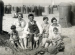 The Stopper family enjoys a day at the beach.

Among those pictured are Erna and Isaac Stopper (seated on the left) with their children Henny (far left) and Tilly (center).