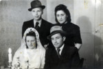Yehoshua Gold and Shulamit Danishevski attend the wedding of friends [unidentified] in the Dachau displaced persons camp.