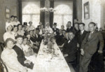 A Dutch Jewish family celebrates a wedding.

Pictured at the end of the table are the bride and groom, Shela (Shifra) Thaler Erlich and Mr.