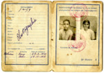 Interior page of a Moroccan passport issued to Zohara Waknine in November 1945, bearing photographs of her children Simcha and Isaac.