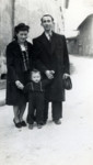 A French Jewish family stands for photograph on the street of Moirans, France.