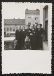 The extended Vandor-Merei (Merey) family poses outside its home in Budapest.