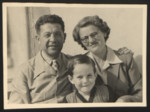 Close-up portrait of Ernest, Ernestine and John Merei taken shortly after their arrival in Switzerland on the Kasztner Transport.