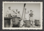 Jewish refugees from the shipwrecked Pentcho,  on the island of Kamilonissi [cooking or desalinating water for drinking?]