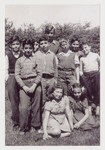 Group portrait of the Ft. Ontario refugee children of the fourth grade class at the Campus School of Oswego State Teachers College, 1944.