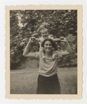 Klara Brecher poses holding her baby son Heinz on her shoulders in Graz, June 2, 1933.