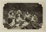Maria Bloch-Bauer (in plaid sweater) poses with friends during a picnic.