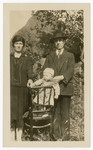 Portrait of a couple and their young baby [probably either the brother or sister of Jack Isaac].