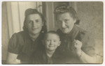 Hilda Jonisch, Michael Bornstein and Sophie Jonisch Bornstein pose together shortly after the war ended.