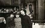 Portrait of three young girls iinside their home.