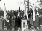 Survivors attend a dedication of the future monument to the victims of the Pocking concentration camp following the exhumation and reburial of the victims .