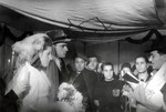 Rabbi Yehuda Lipot Meisels conducts a wedding in the Pocking displaced persons camp.
