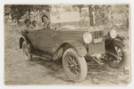Family goes for a ride in their private automobile.