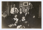 The extended Schwarz family poses for a group portrait in their home.