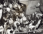 Jewish refugees wait aboard the Josiah Wedgwood after the British navy fired at  the ship.