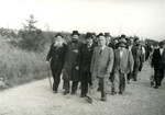 Rabbi Yehuda Lipot Meisels (front row, second from right) leads a procession to the dedication of a monument to the victims of the Pocking concentration camp.