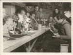 Internees decorate toys in a workshop in Les Milles.