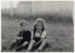 Close-up portrait of two Jewish children [probably in the Steyr] displaced persons camp in Austria.