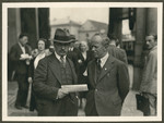 Two men confer probably during the 18th Zionist Congress.