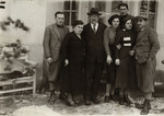 The  Weisz family poses outside its home in prewar Hungary.