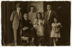 Prewar portrait of the Gold family.

From left to right are Hymie Schiffman, a cousin from Romania, Fanny Gold, Erna Schiffman, Peter Gold and Ruth Gold.