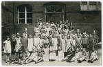 Group portrait of school girls in the Leobschuetz elementary school.