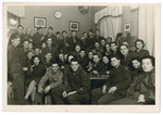 Group portrait in Otto's Pub in Offenbach of  some of the staff of the American War Department's Civil Censorship Division.