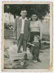 The Lanzer family poses outside shortly after arriving in Palestine.