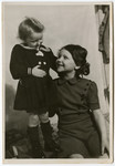 Studio portrait of two sisters in the Schlachtensee displaced persons' camp: Nonna (b.