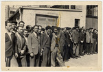 Jewish men gather in the Ziegenhain displaced persons' camp.