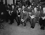 The defendants remove their shoelaces and personal possessions at the beginning of the trial of 61 former camp personnel and prisoners from Mauthausen.