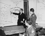 Tadeusz Patzer, a prosecution witness from Poland, points out the location of the labor allocation offices at Nordhausen, during the trial of former camp personnel and prisoners from Dora-Mittelbau.