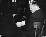 Friedrich Hoffman, a Czech priest, testifies at the trial of former camp personnel and prisoners from Dachau.