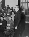 Former Dachau inmate Helmuth Breiding identifies former SS-Sturmbannfuehrer Friedrich Weitzel as the man in charge of food, clothing, and shelter, at the trial of former camp personnel and prisoners from Dachau.
