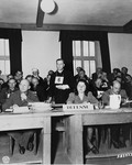 Former SS 2nd Lieutenant Dr. Hans Eisele cross-examines a witness in his own defense at the trial of former camp personnel and prisoners from Buchenwald.