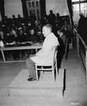 Wilhelm Wagner, defendant and former supervisor of the camp laundry, testifies at the trial of former camp personnel and prisoners from Dachau.