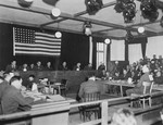 Defendant Otto Foerschner testifies at the trial of former camp personnel and prisoners from Dachau.