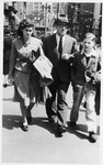 Peter Watkins greets his stepchildren, Gerhard and Sylvia, upon their arrival in Sydney.