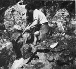 Jewish refugee Eryk Golfarb works at widening a mountain road while living in hiding in Col de Menee, France.