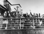 Jewish refugee children, who are members of the first Kindertransport from Germany, arrive in Harwich, England.