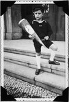 Fritz Glueckstein holds a cone of treats on his first day of school.