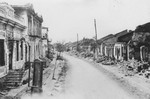 View of a bombed out street in German occupied eastern Europe.