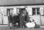 Jewish DPs stand in line at the entrance to the housing office at the Neu Freimann displaced persons camp.
