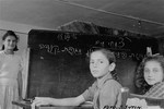 Jewish girls study Hebrew in a classroom at the Neu Freimann displaced persons camp.
