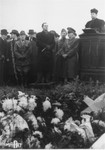 Rabbi Jozsef Katona (right) conducts a memorial service at the Jewish cemetery, 6 Kozma Street, on the occasion of the reinterment of 1,526 Jewish victims killed during the executions of labor battalions in Hidegseg, Ilona-Major and Fertorakos at the end of the war.