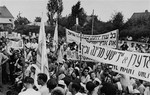 Jewish DPs hold flags and banners during a Zionist demonstration at the Neu Freimann displaced persons camp.